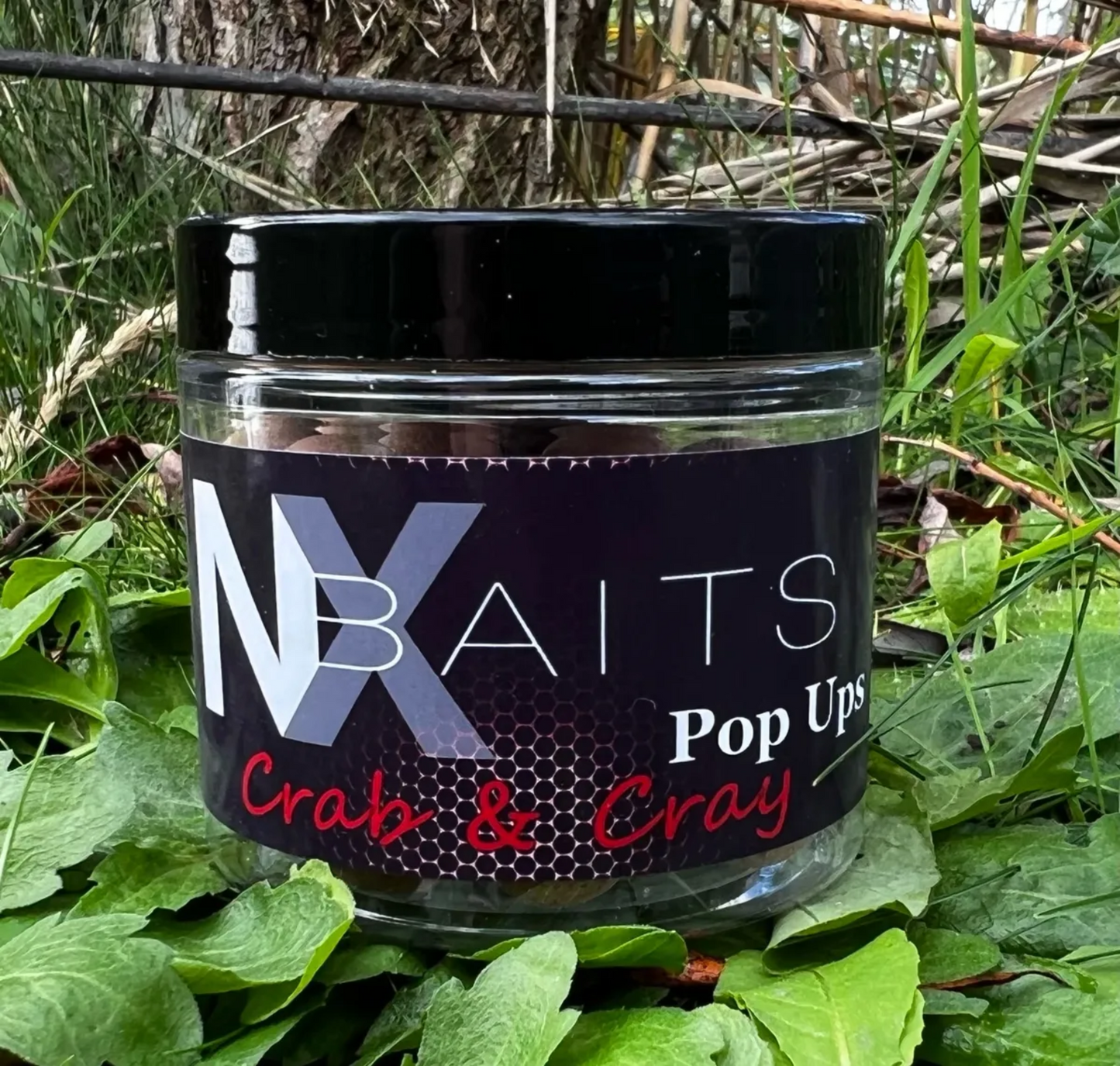 NX Baits Crab & Crayfish Pop Ups - Ultra-buoyant fishing bait in a plastic pot, available in 12mm & 15mm sizes, perfect for attracting carp, tench, and barbel